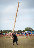 Bill tossing the caber at the Highland Games