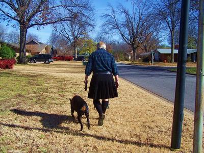 All black kilt and Black watch tartan shirt.