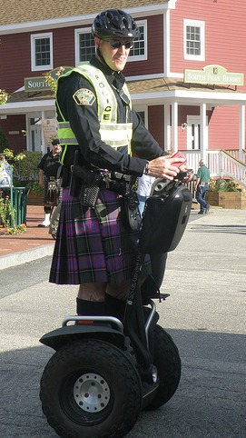 men wearing kilts