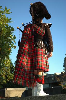 Scottish Piper waiting to play at a wedding