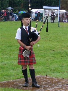 kilts and Scotland boy piper