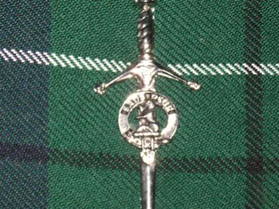 close up of decorative kilt pin