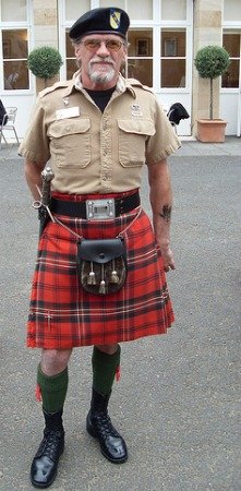 men wearing kilts