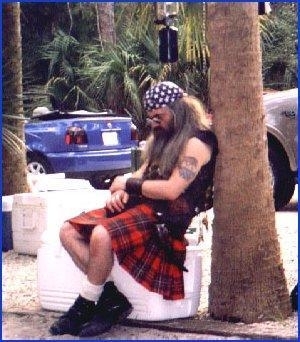Pedro dressed in his kilt taking a nap