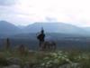 Lone piper in the Scottish hills